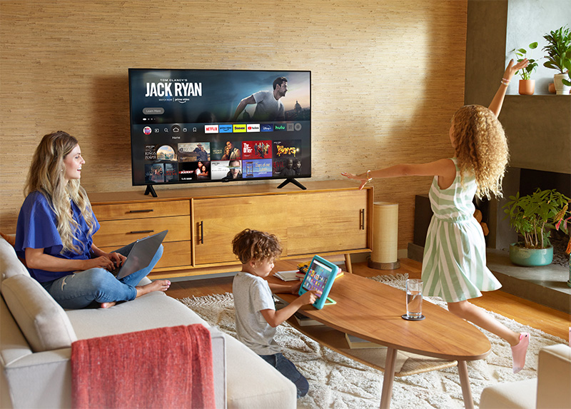 Family gathering to watch Fire TV in the Living Room